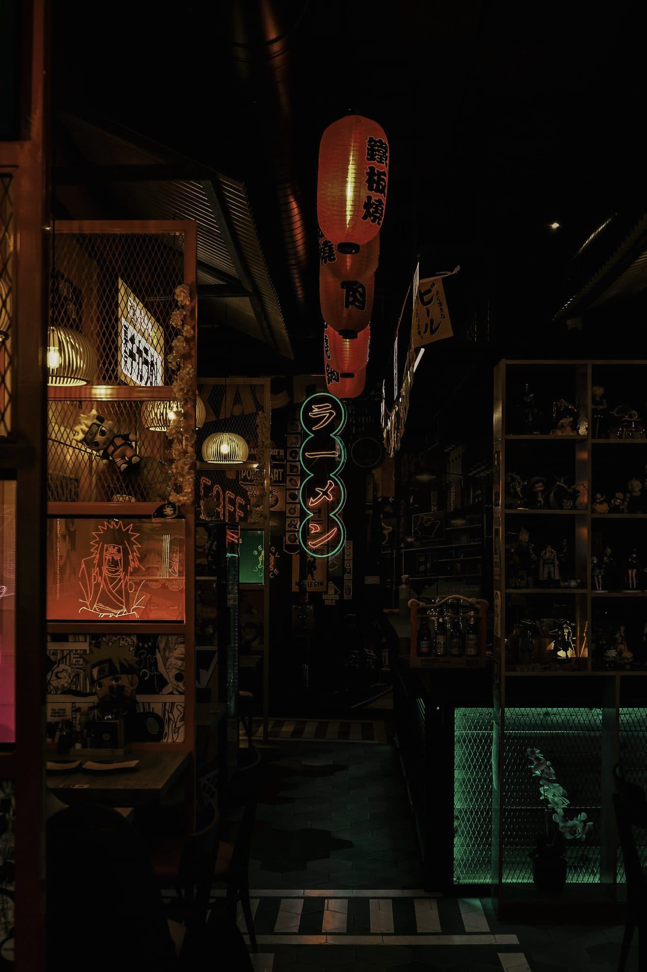 A lantern-lit Japanese alley at night with glowing signs